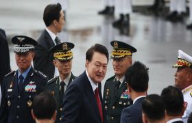 South Korean president defies arrest in standoff with officials over martial law order