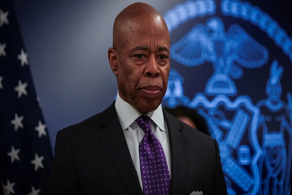 Judge declines to immediately dismiss Eric Adams’ corruption case, delays trial