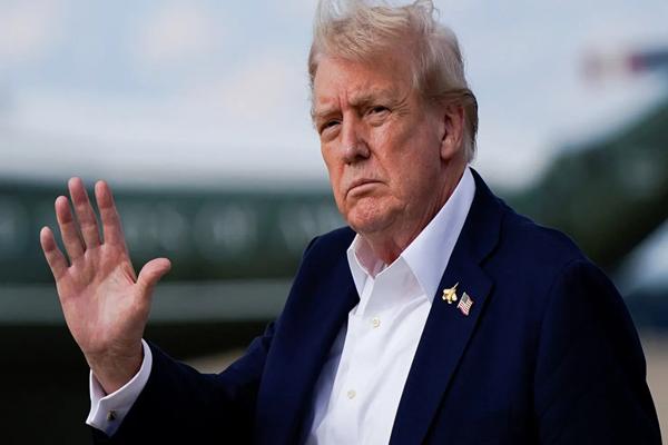 Trump threatens mass firings of federal workers if government shutdown isn’t averted, NBC News reports