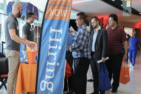 Payrolls rose by 64,000 in November after falling by 105,000 in October, delayed jobs numbers show