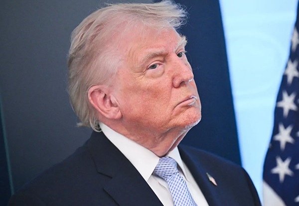 Trump threatens tariffs of 50% on countries 'supplying military weapons to Iran'